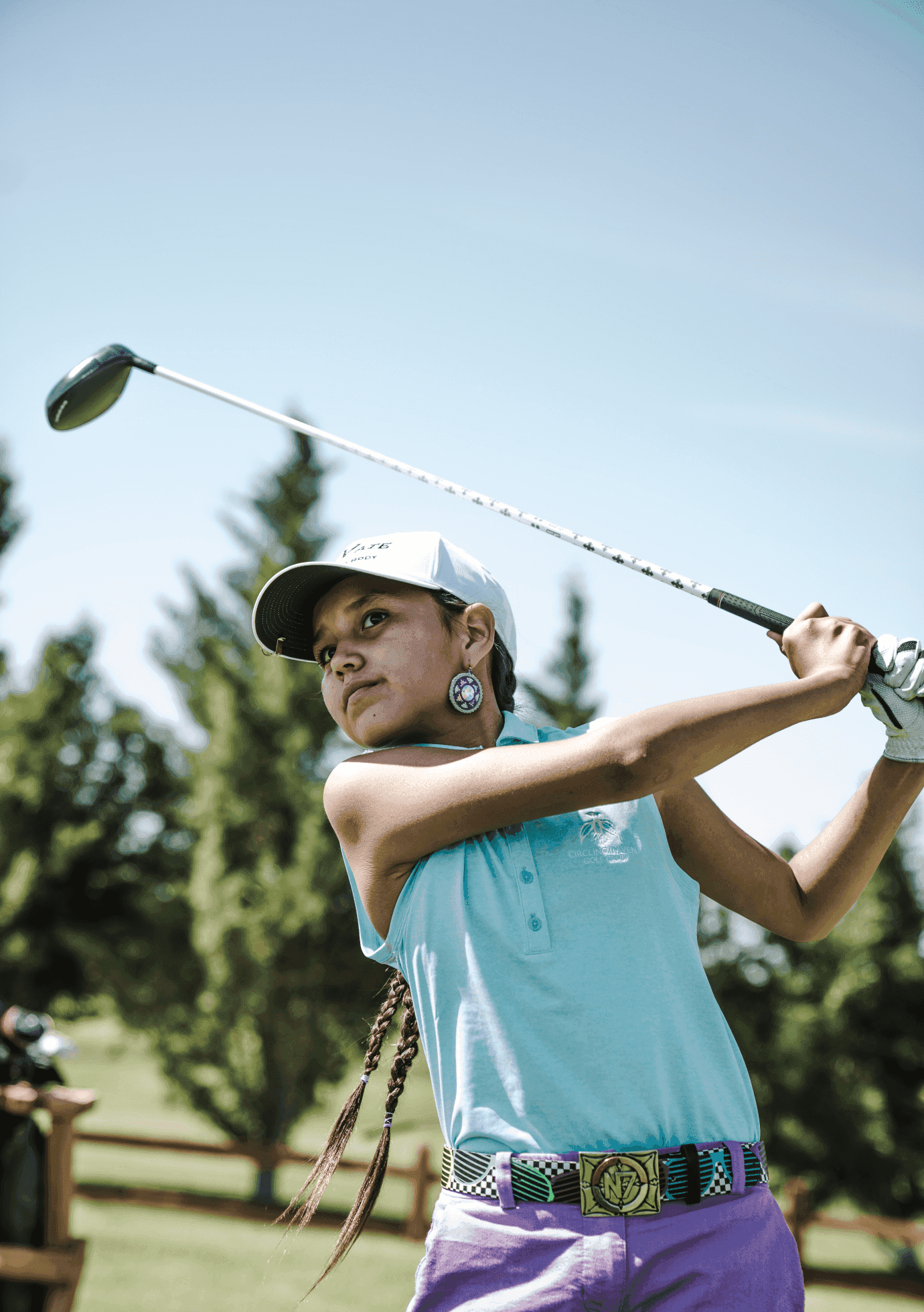 Junior Tour Performance Golf Academy Students lined up with their golfing equipment.